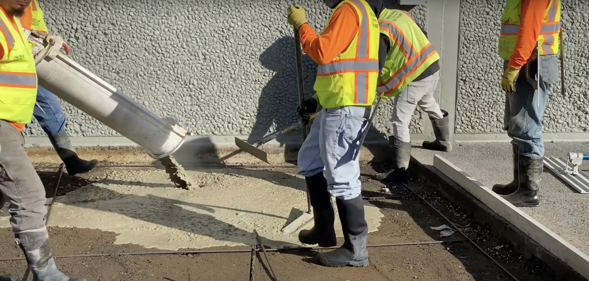Expert concrete installation team in Dover, NH Professional concrete crew working on commercial concrete project