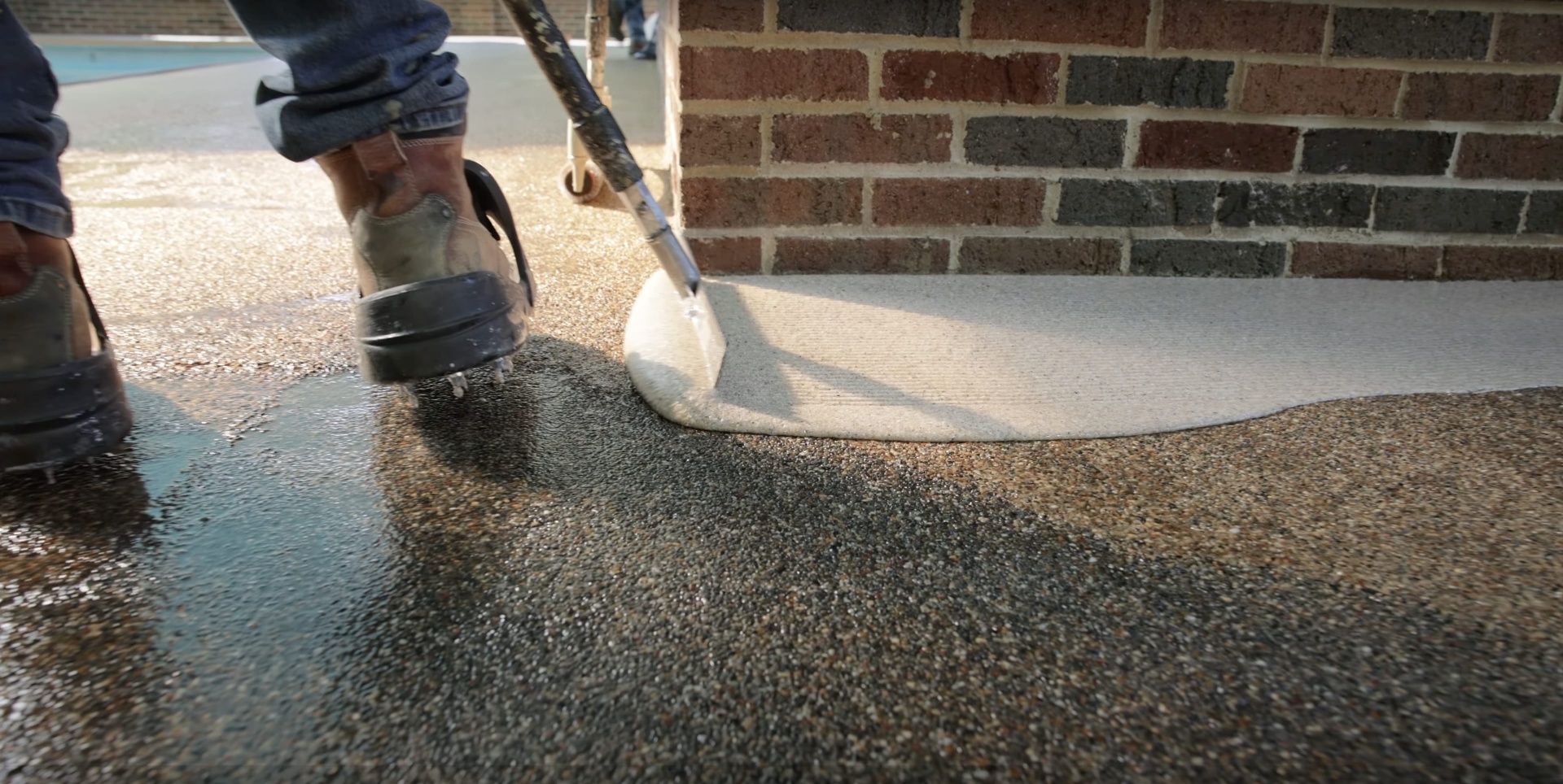 Expert concrete installation by Dover Concrete Construction Professional concrete installation work showing smooth concrete pouring technique